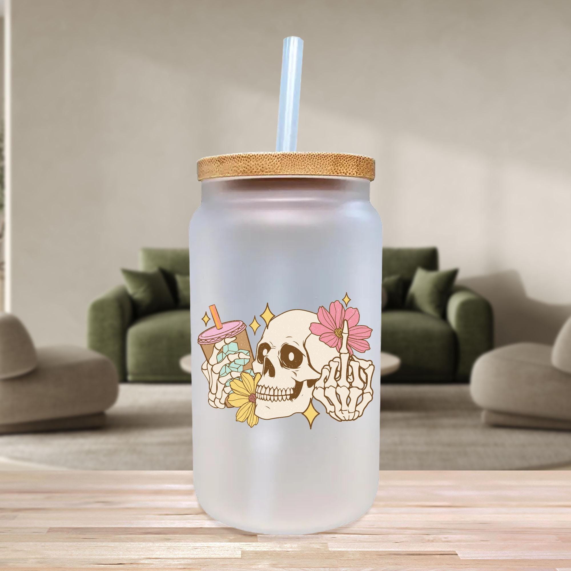a glass with a straw in it on a table