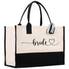 a black and white tote bag with a bride written on it