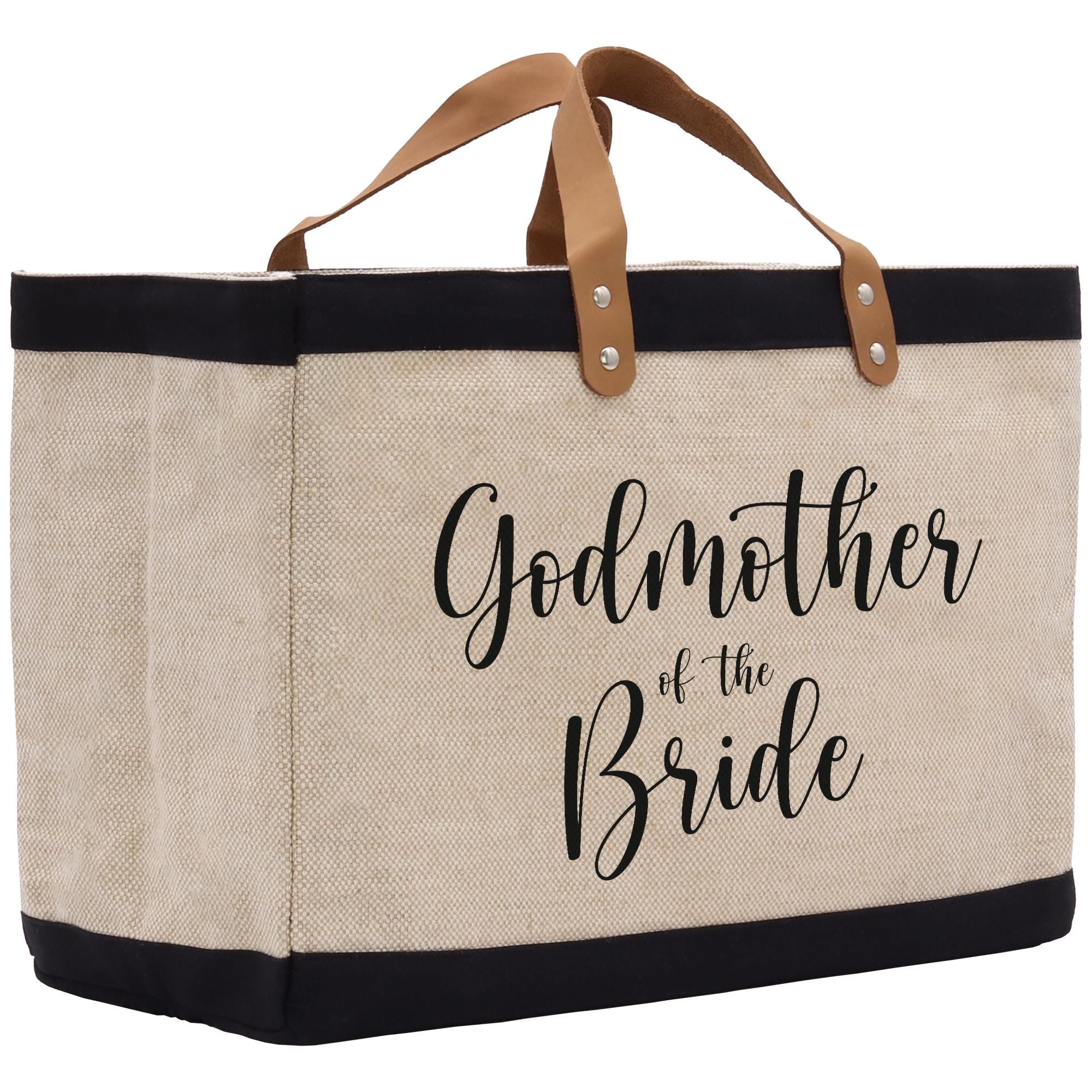 a canvas tote bag with the words godmother of the bride printed on