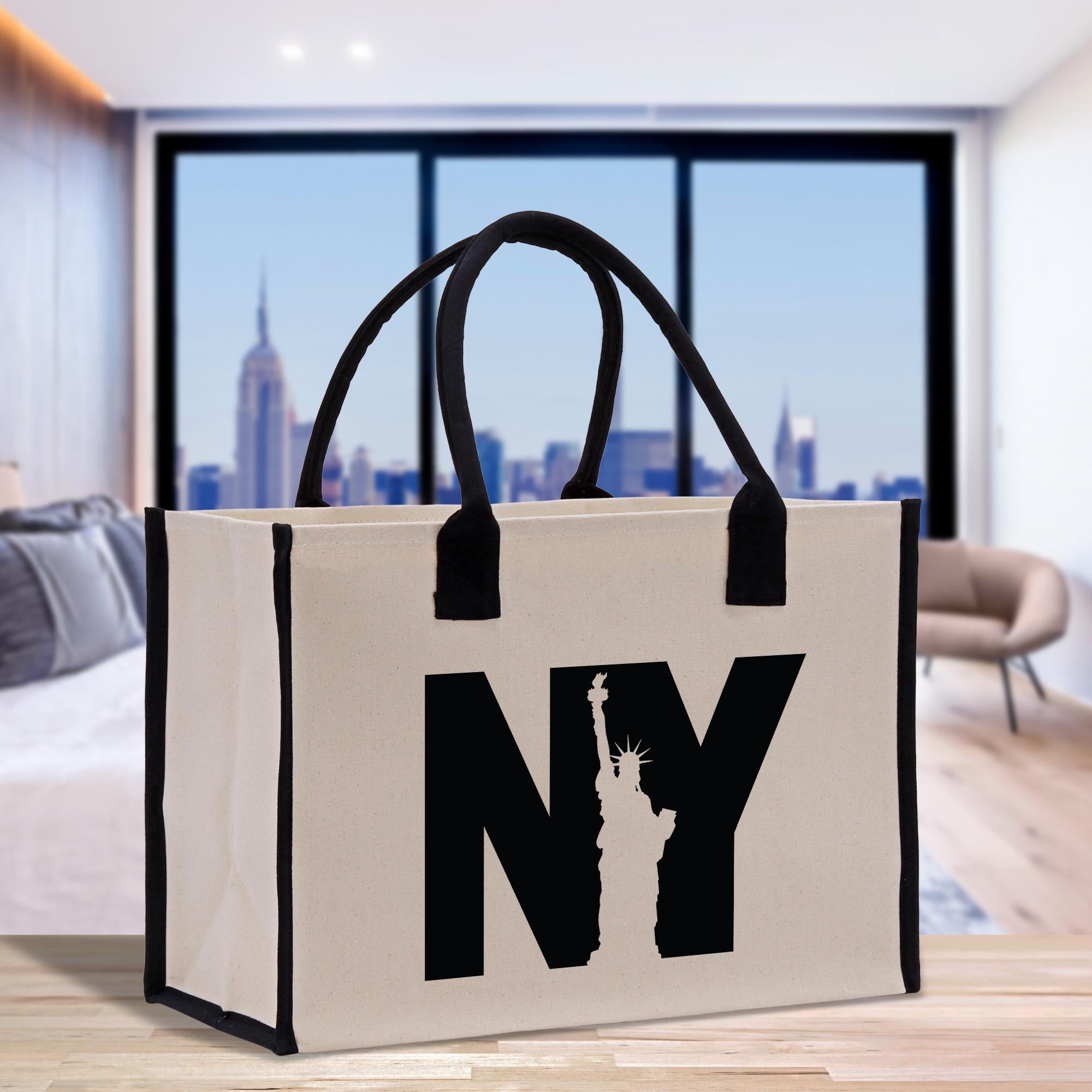a new york bag with the statue of liberty in the background