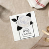 a card with a white rose on it