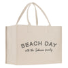 a white bag with the words beach day on it