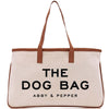 a white bag with a brown leather handle