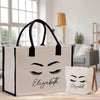 a bag with a face drawn on it next to a bag with eyelashes