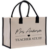 a white and black bag with a black handle
