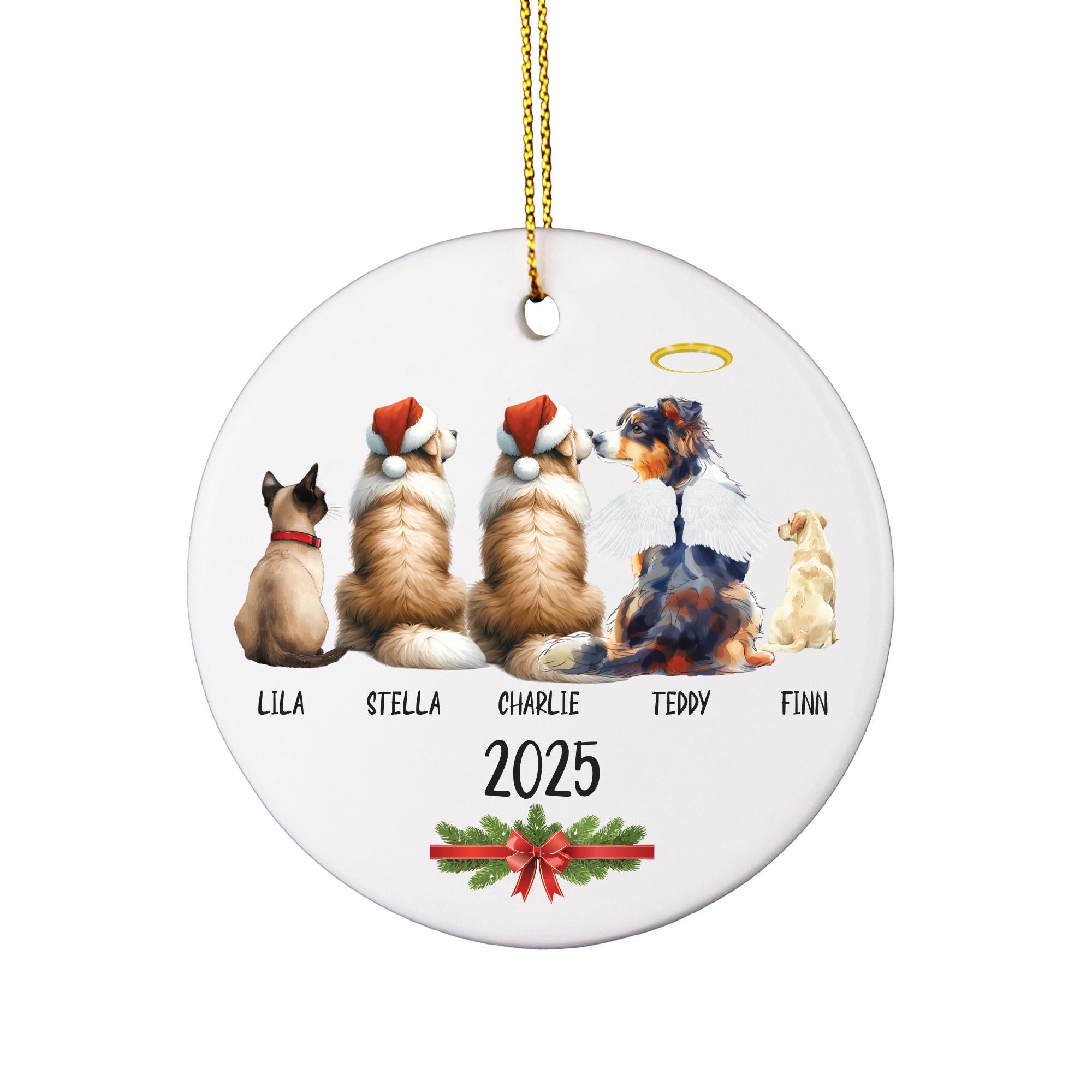 a christmas ornament with three dogs wearing santa hats