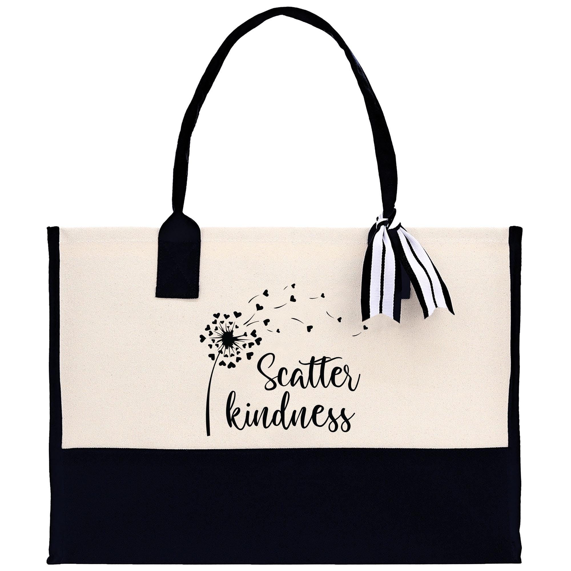 a black and white bag with a dandelion on it