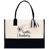 a black and white bag with a dandelion on it