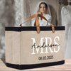 a canvas tote bag with a bride's name on it