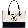 A tote bag with a black and white design featuring the text 