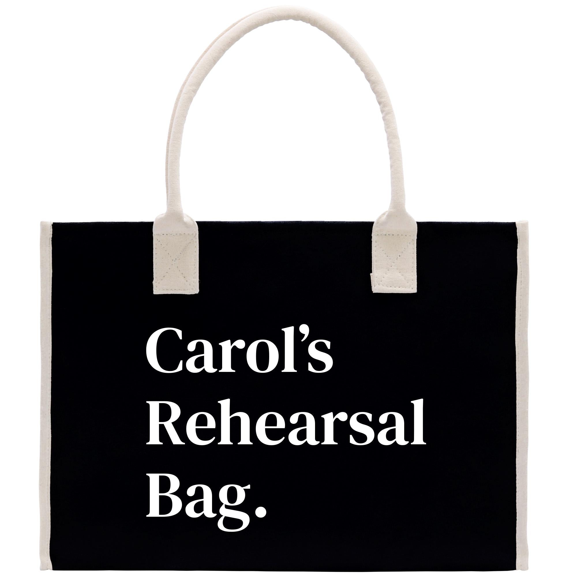 a black and white shopping bag with the words carol&#39;s rehearal bag