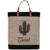 A beige tote bag with a black handle and a black cactus design printed on it. The bag has a black strap and the name "Carol" printed below the cactus design.