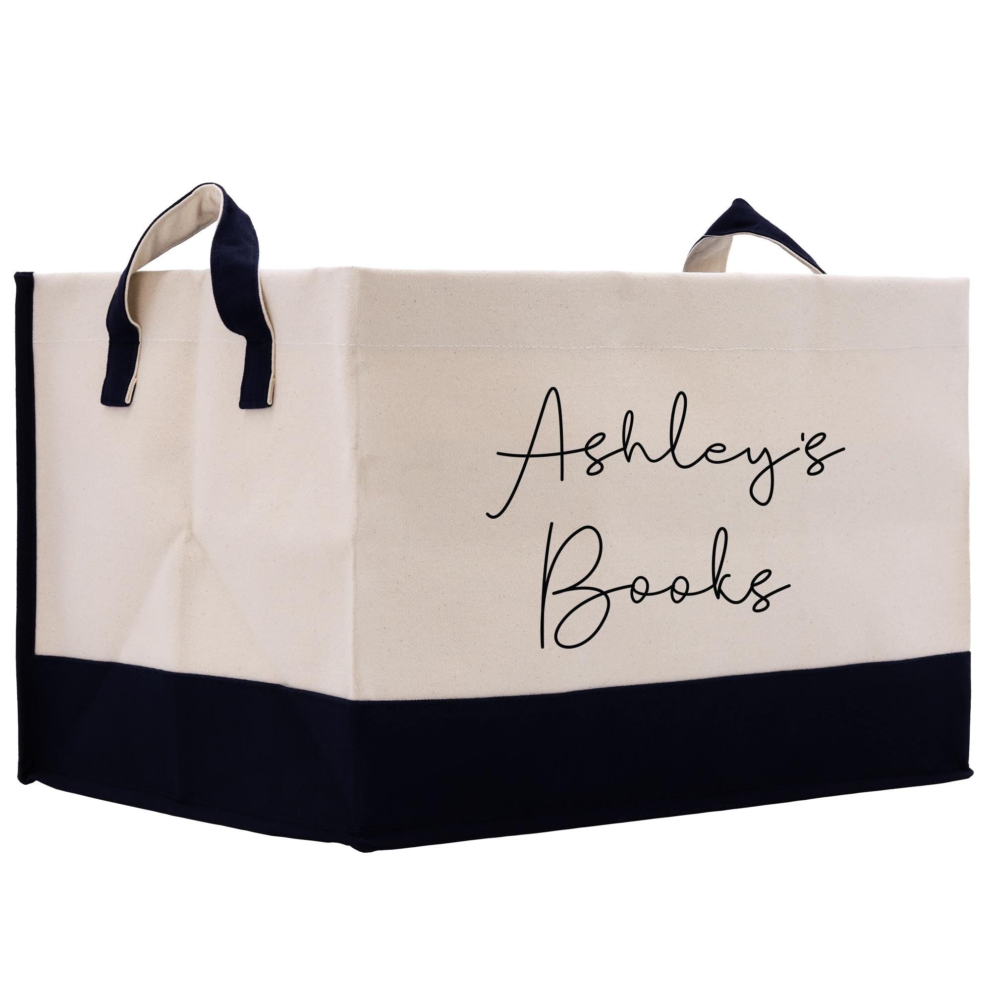 a black and white shopping bag with the words ashley&#39;s books written on