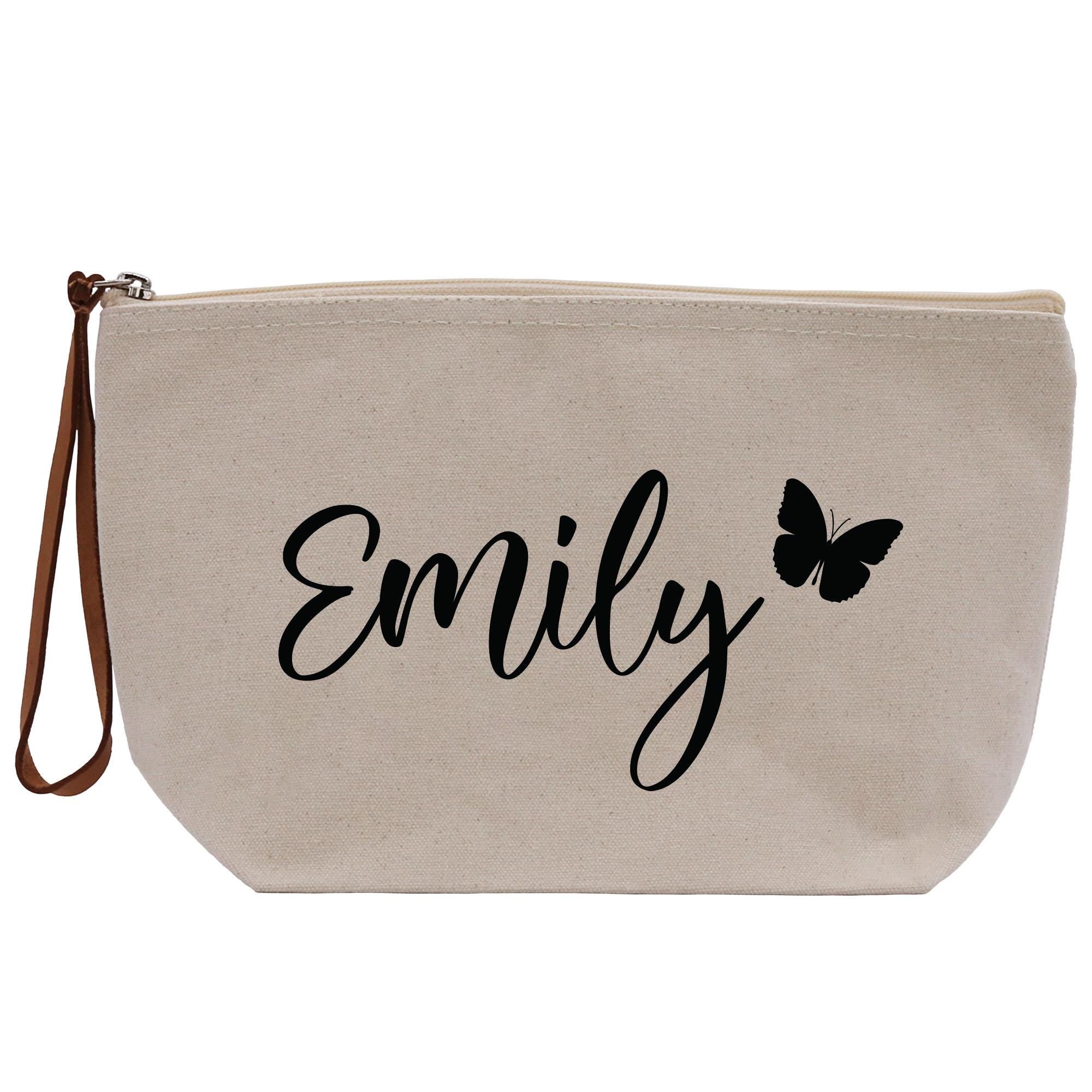 a white canvas bag with a butterfly on it