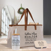 a tote bag with a bottle of water next to it