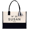 A black and white tote bag with the text "No 30 Susan" printed on it.