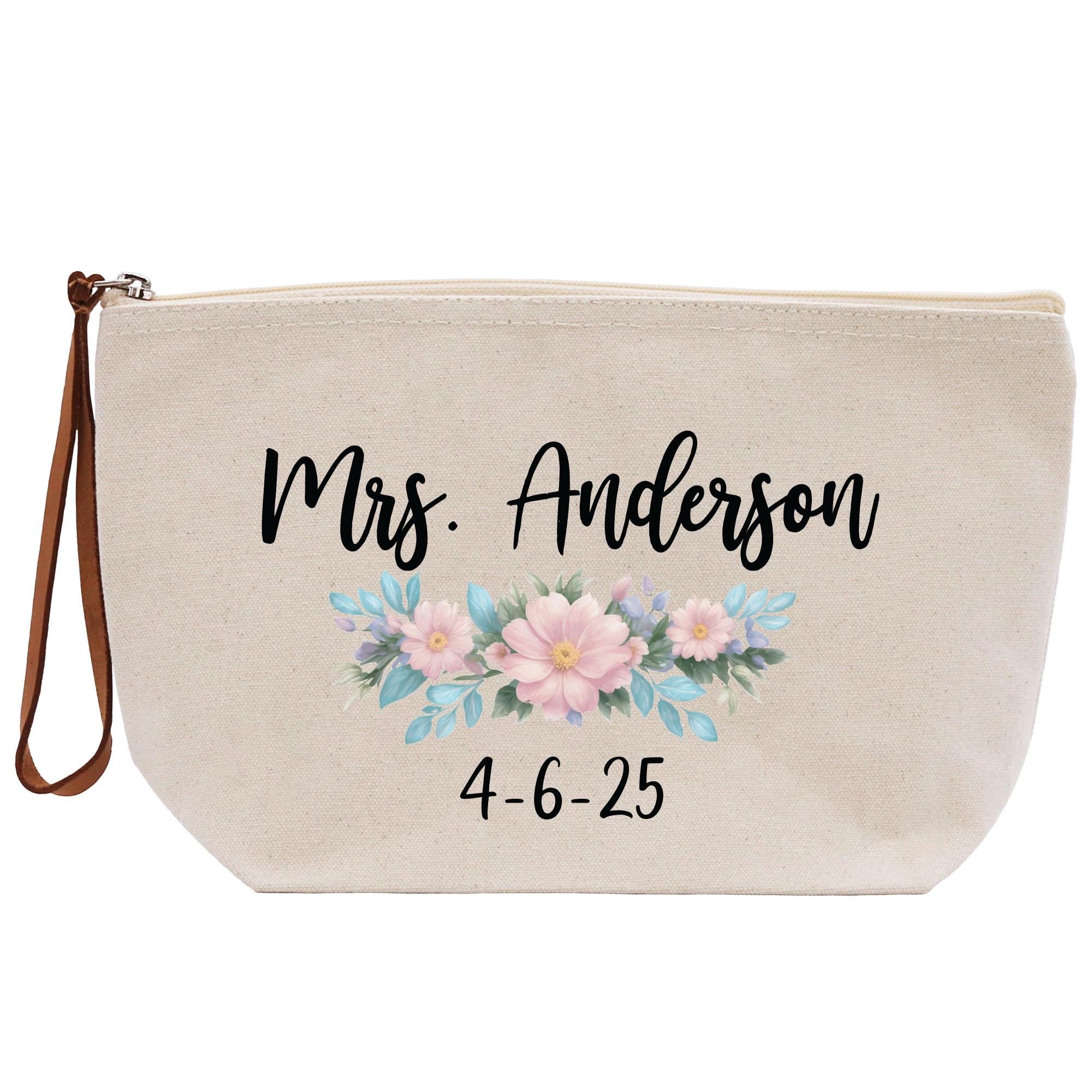 a personalized makeup bag with flowers on it