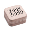 A pink, square-shaped makeup case with the text "YOUR LOGO" printed on it in a stylized font.