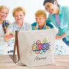 A group of people, including two women and a child, are gathered around a table playing a game, with a white bag featuring a colorful bingo design in the foreground.