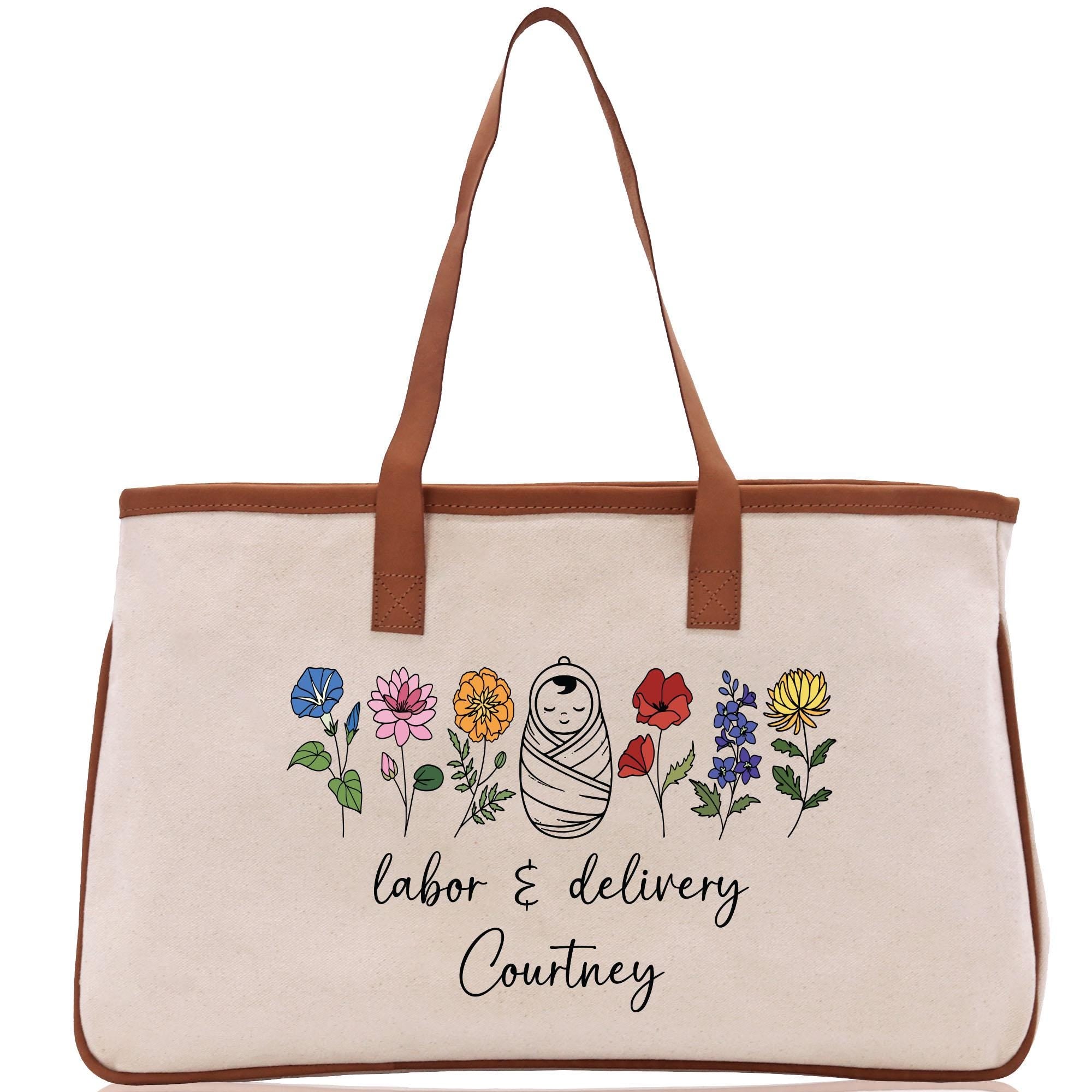 a canvas bag with a picture of a woman and flowers on it