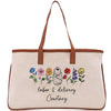 a canvas bag with a picture of a woman and flowers on it