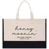 a black and white shopping bag with the words honey moon on it