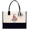 a black and white bag with a picture of a girl on it