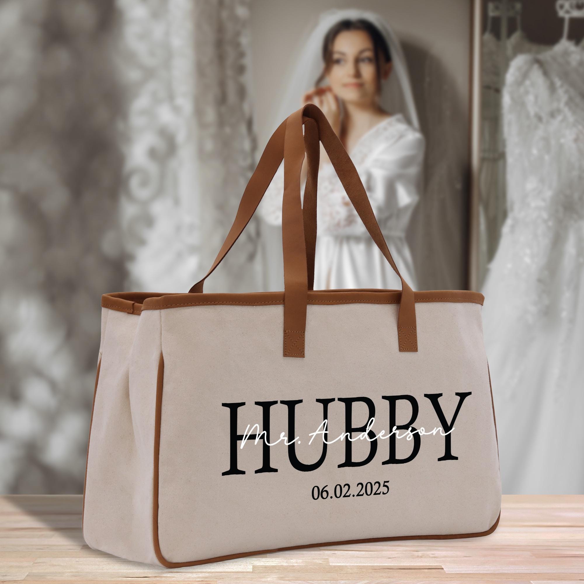 a white bag with the word hubby printed on it