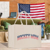 a shopping bag with the american flag in the background