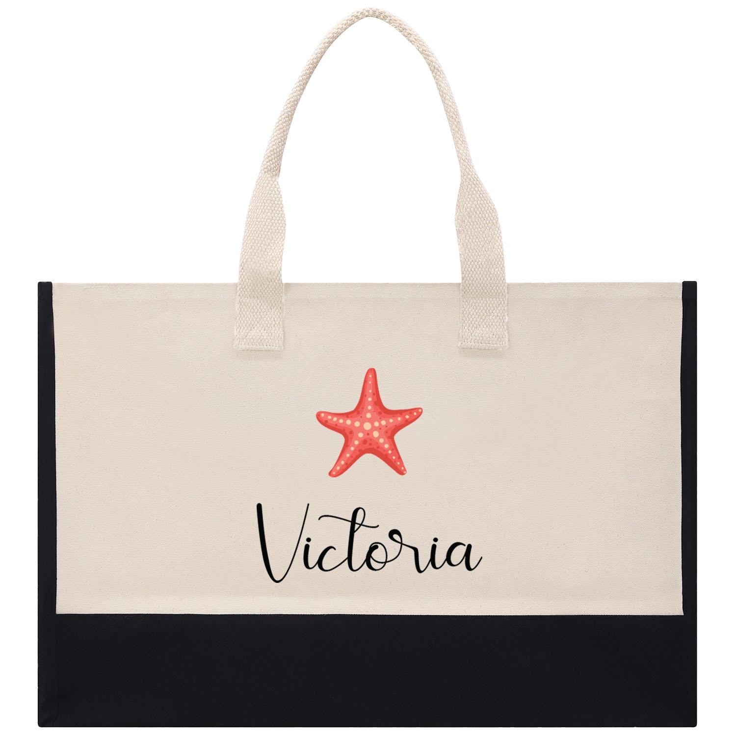 a white and black bag with a starfish on it