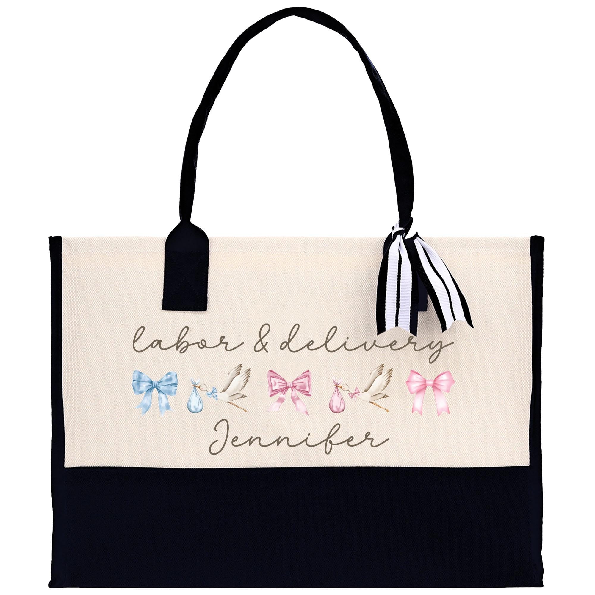 a black and white bag with a name on it