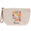A beige canvas tote bag with a colorful text design printed on it.