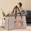 A beige canvas tote bag with a graphic design printed on it, featuring the text 