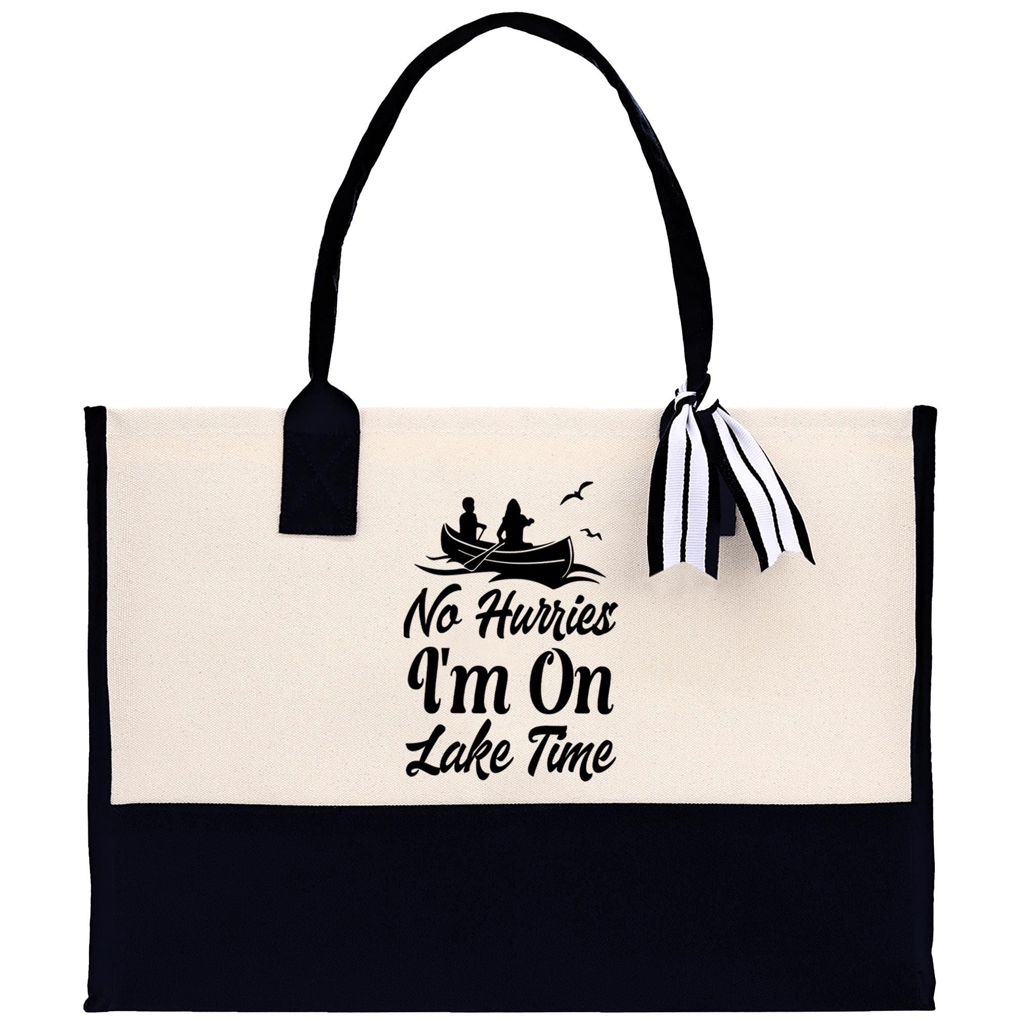 A tote bag with a black and white design, featuring a boat and the text "No Hurries I'm On Lake Time".