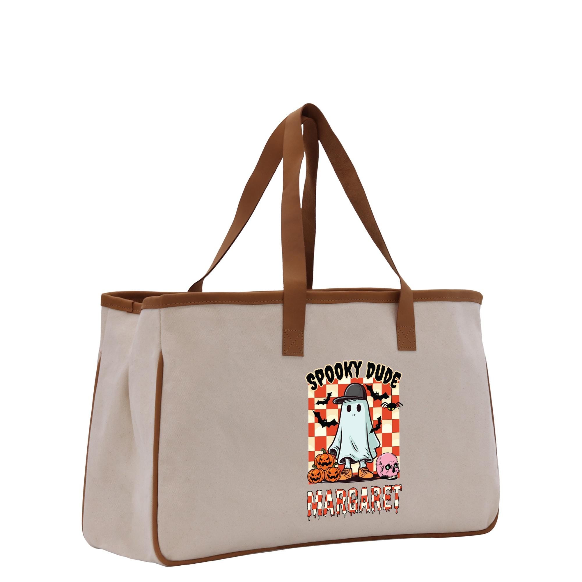 a canvas bag with a cartoon ghost on it