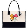 A tote bag with a black and white striped ribbon and a pencil-shaped bow on it, along with a tag that says "Mrs. Roberts".
