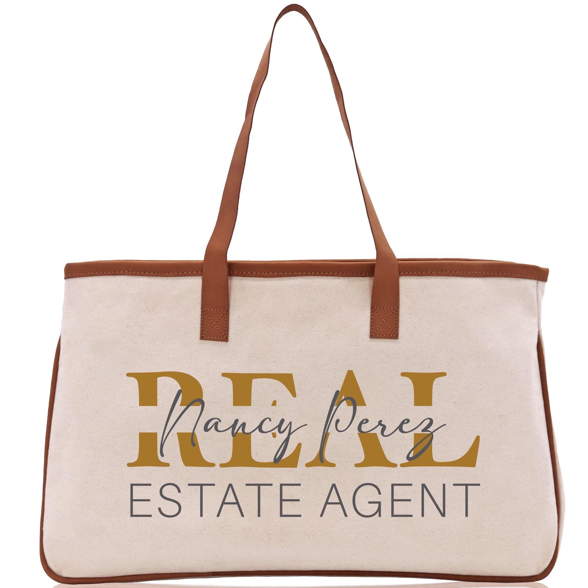 a white and brown bag with a brown handle