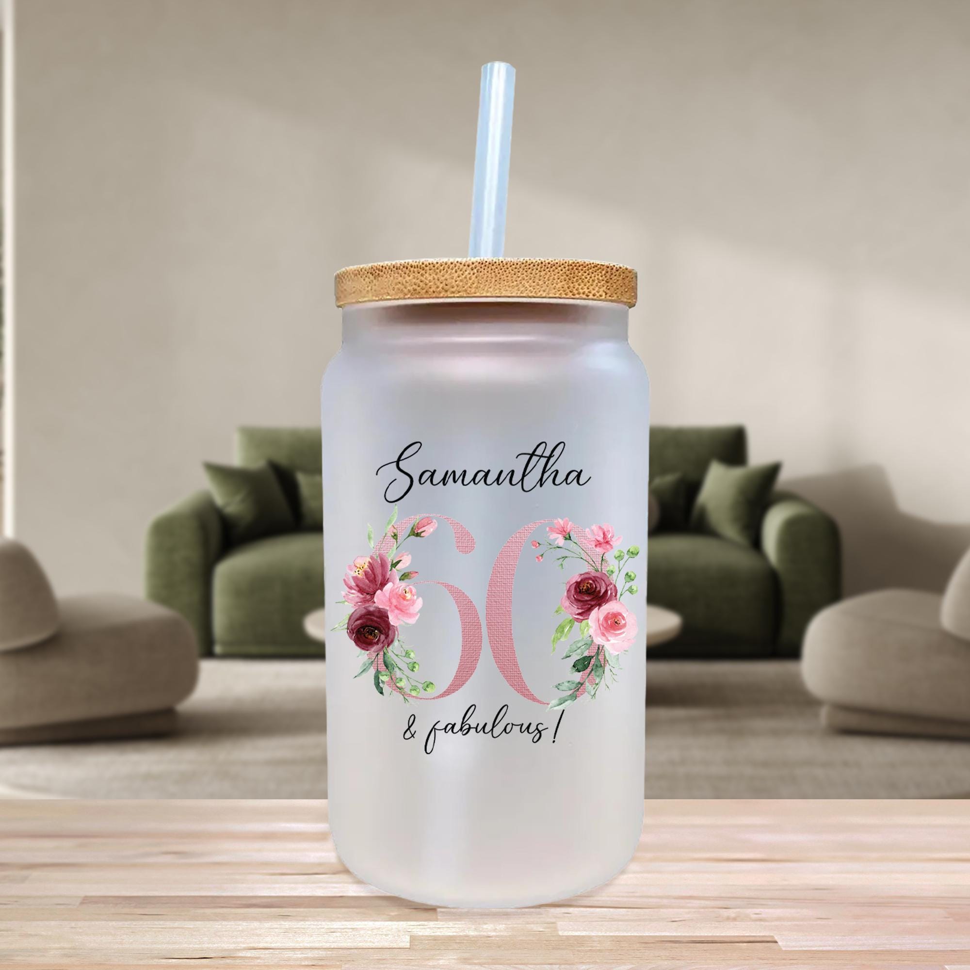 a glass with a straw in it sitting on a table