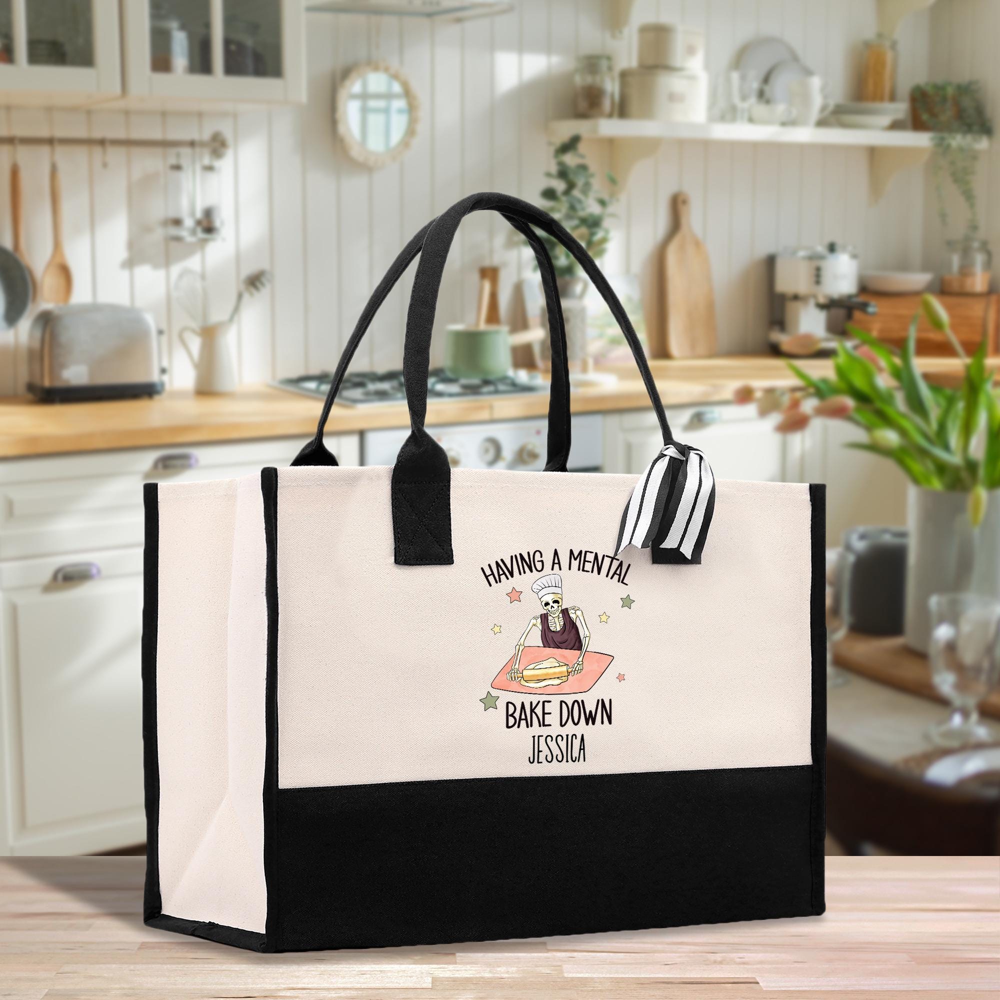 a black and white bag sitting on top of a wooden table