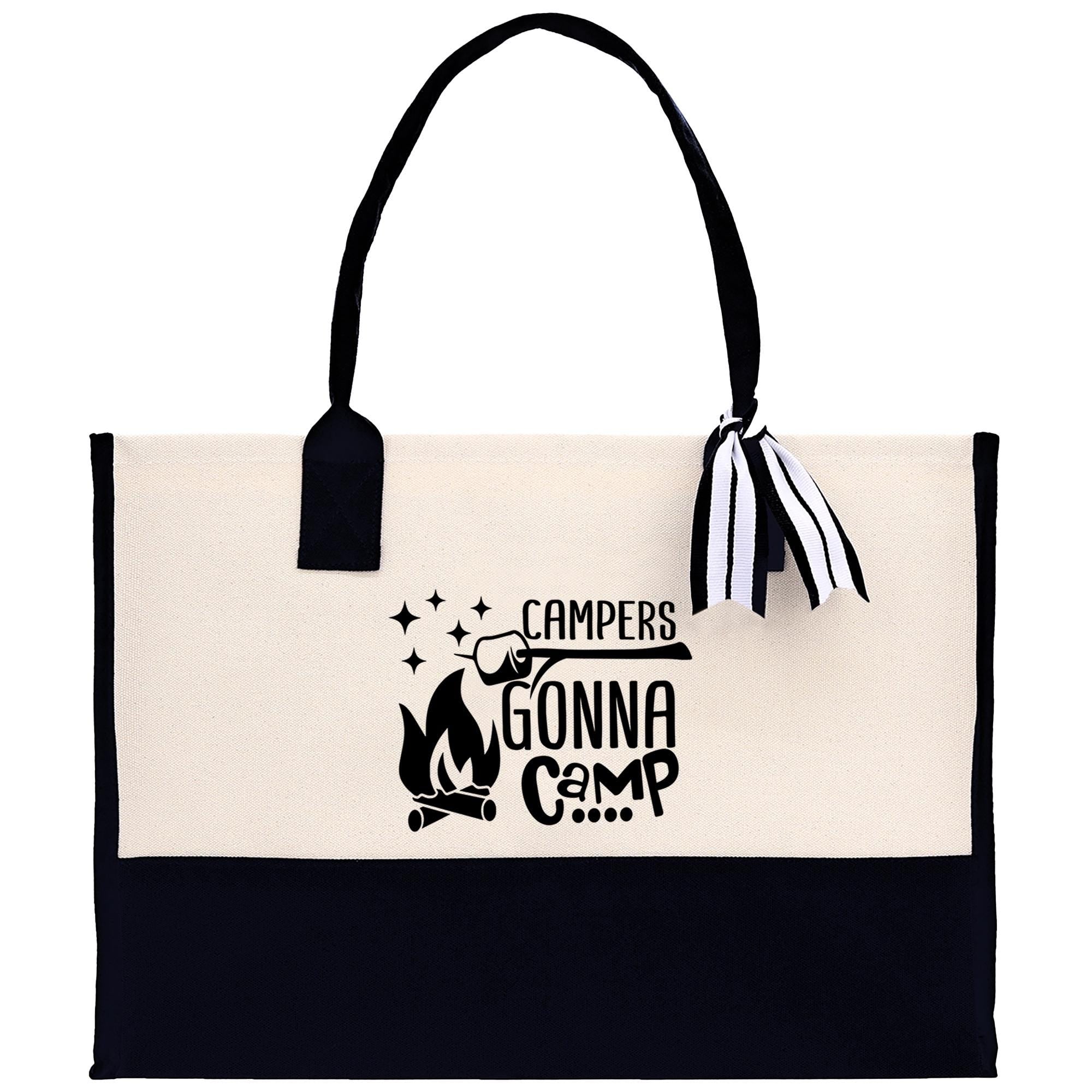 A beige tote bag with a black handle and strap, featuring a printed design that says "Camper's Gonna Camp" along with a graphic of a campfire and stars.