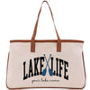 a white bag with a brown handle and a lake life logo on it