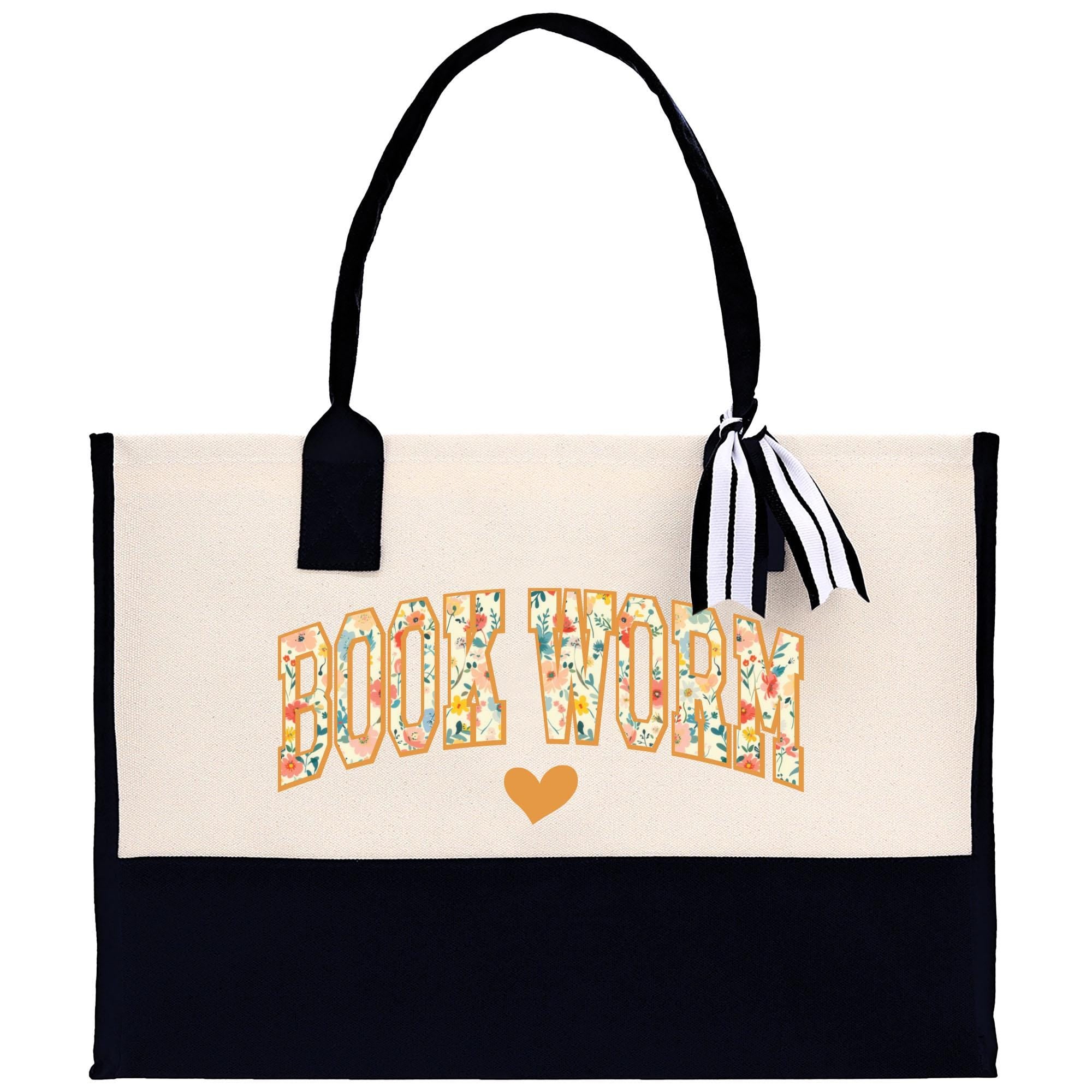 a black and white bag with a bow on it