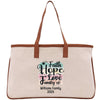 A beige canvas tote bag with a brown leather strap and a printed design on the front that says "Faith Hope Love Family" and "Williams Family 2020".