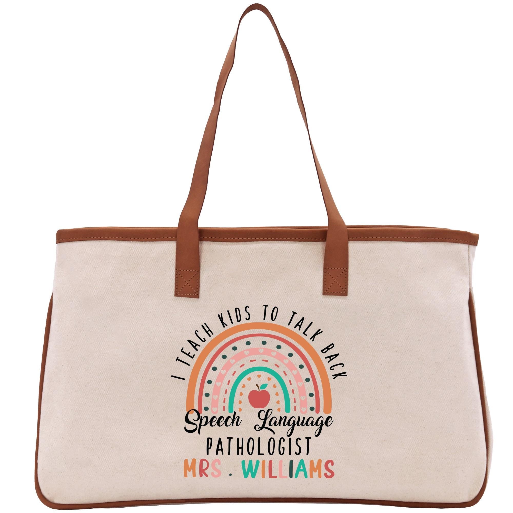 a canvas bag with a rainbow design on it