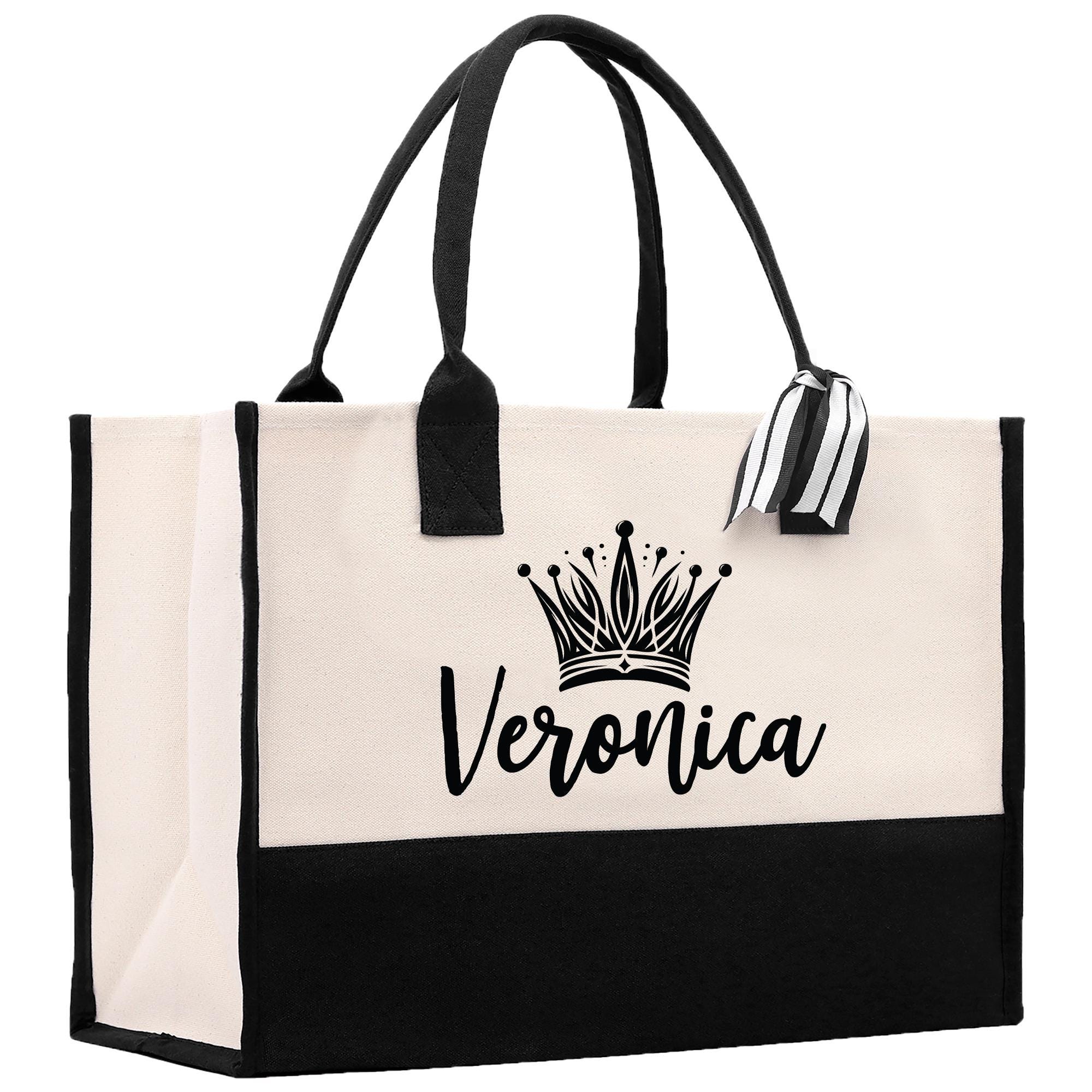 A large tote bag with a black and white color scheme, featuring a crown design and the name &quot;Veronica&quot; printed on it.