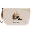 a white bag with a pair of shoes on it