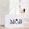 a white bag with the word mob written on it