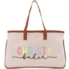 a white bag with a brown leather handle