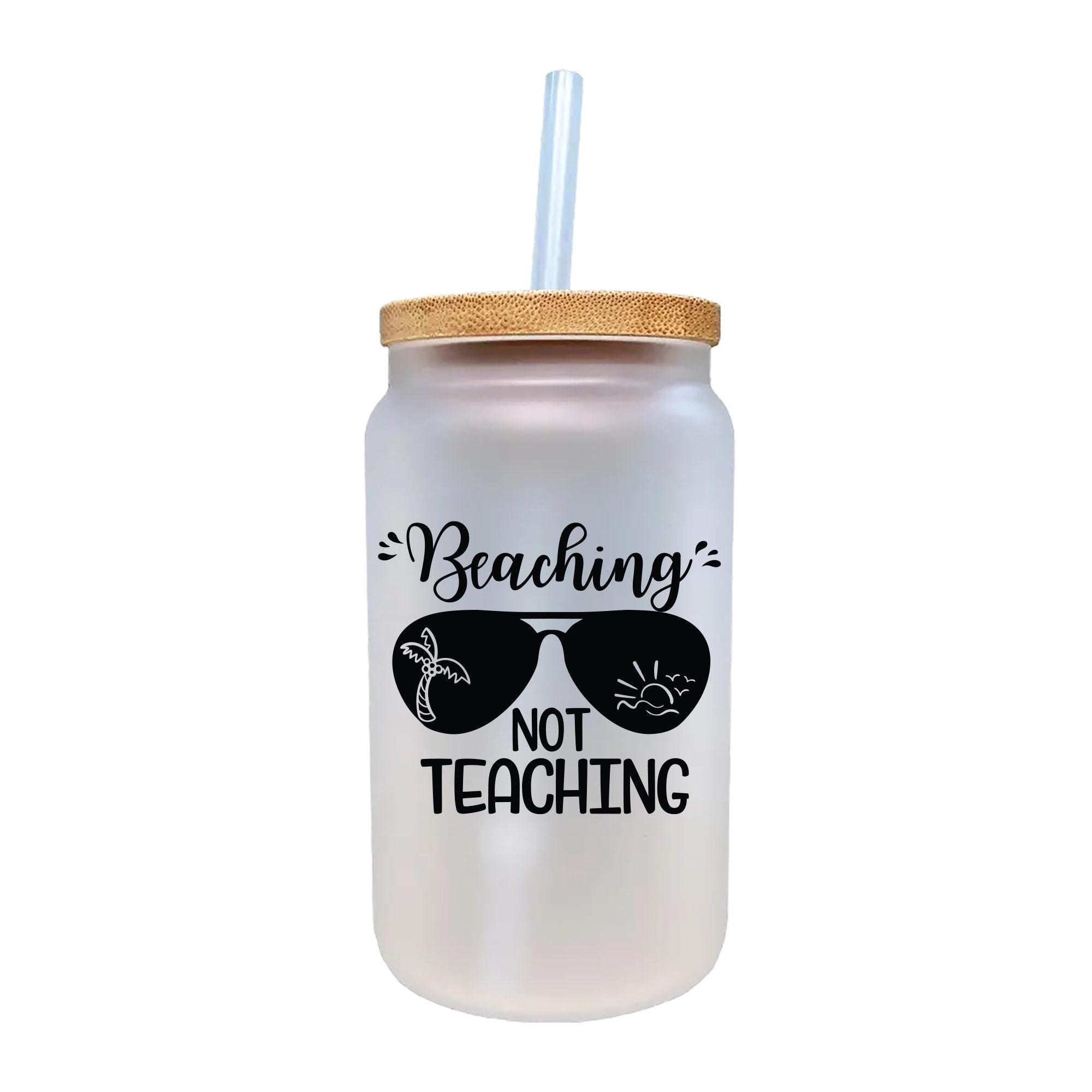 a white glass with a straw in it