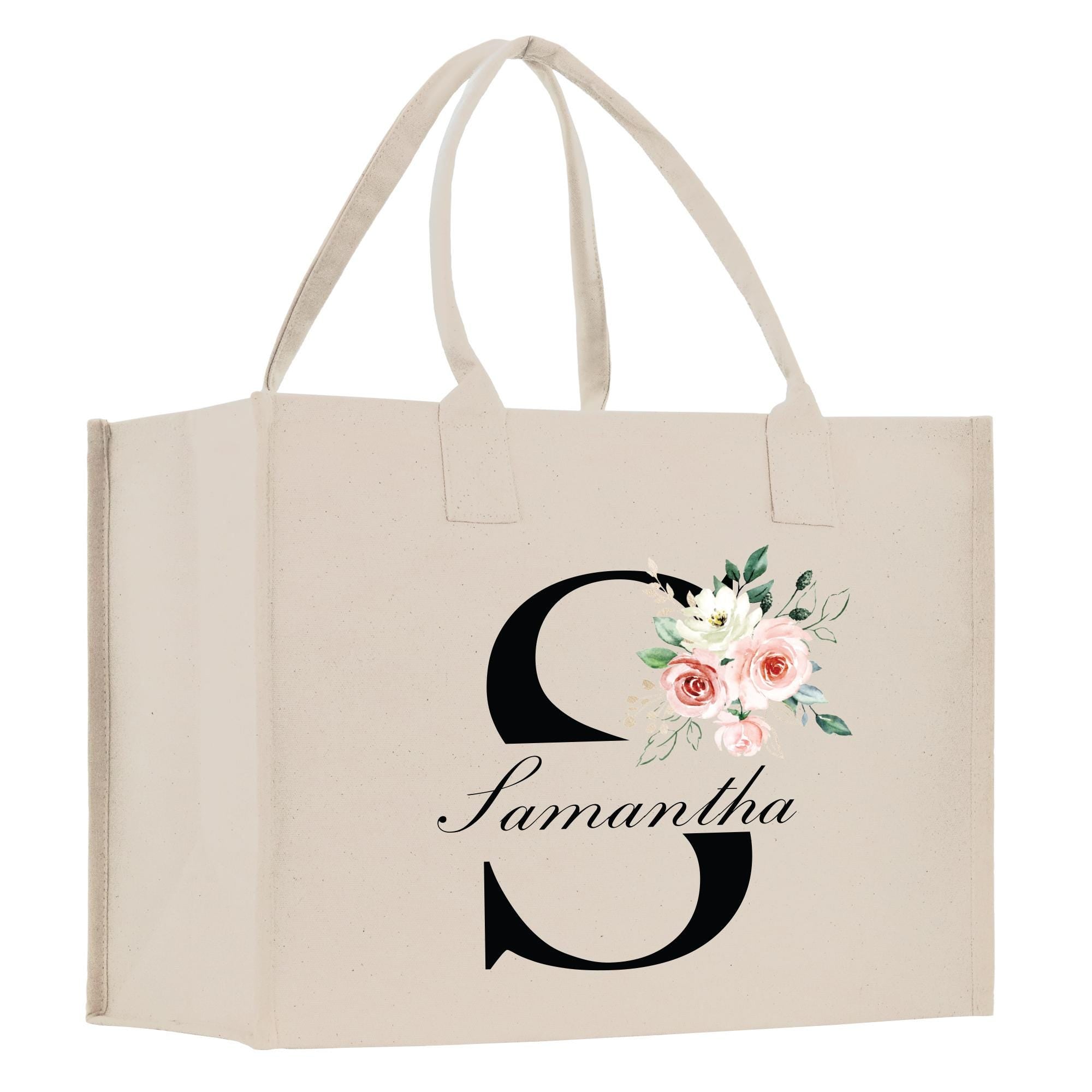 a white bag with a flower and the letter s on it